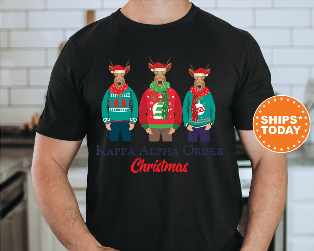 a man wearing a black shirt with three reindeers wearing ugly sweaters