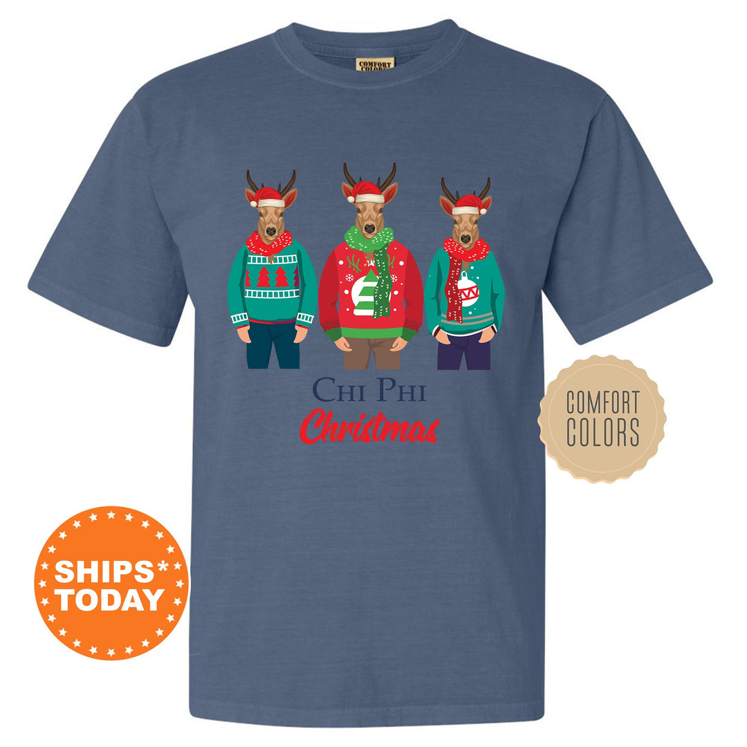 a blue shirt with three reindeers wearing ugly sweaters