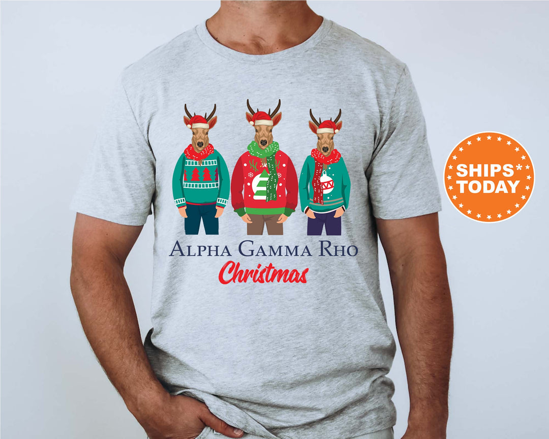 a man wearing a t - shirt with three reindeers wearing ugly sweaters