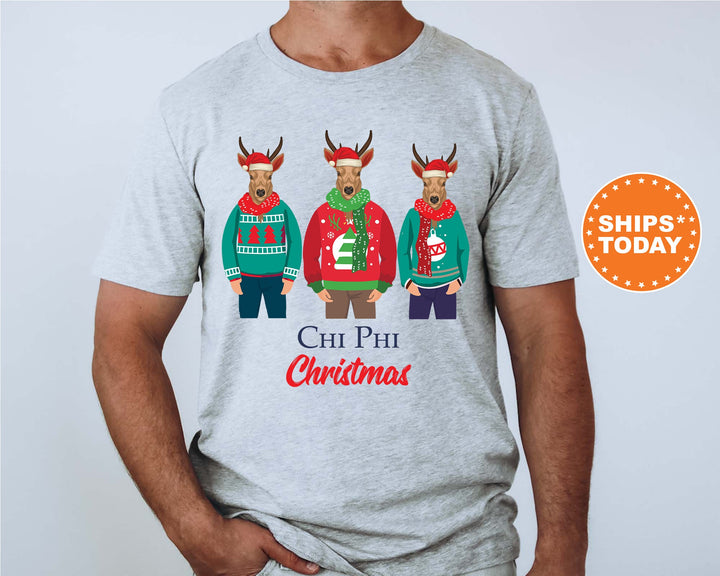 a man wearing a t - shirt with three reindeers wearing ugly sweaters