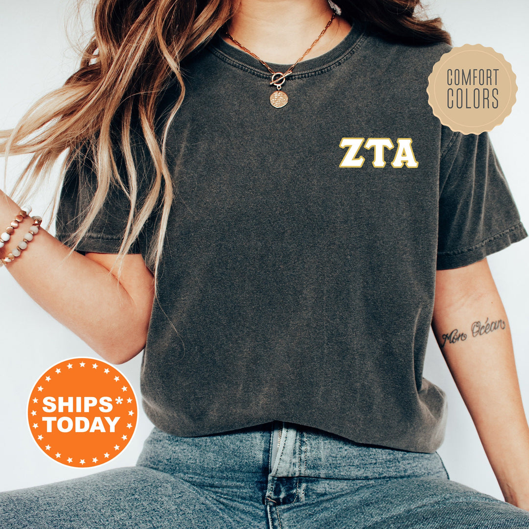 a woman wearing a t - shirt with the word zta on it
