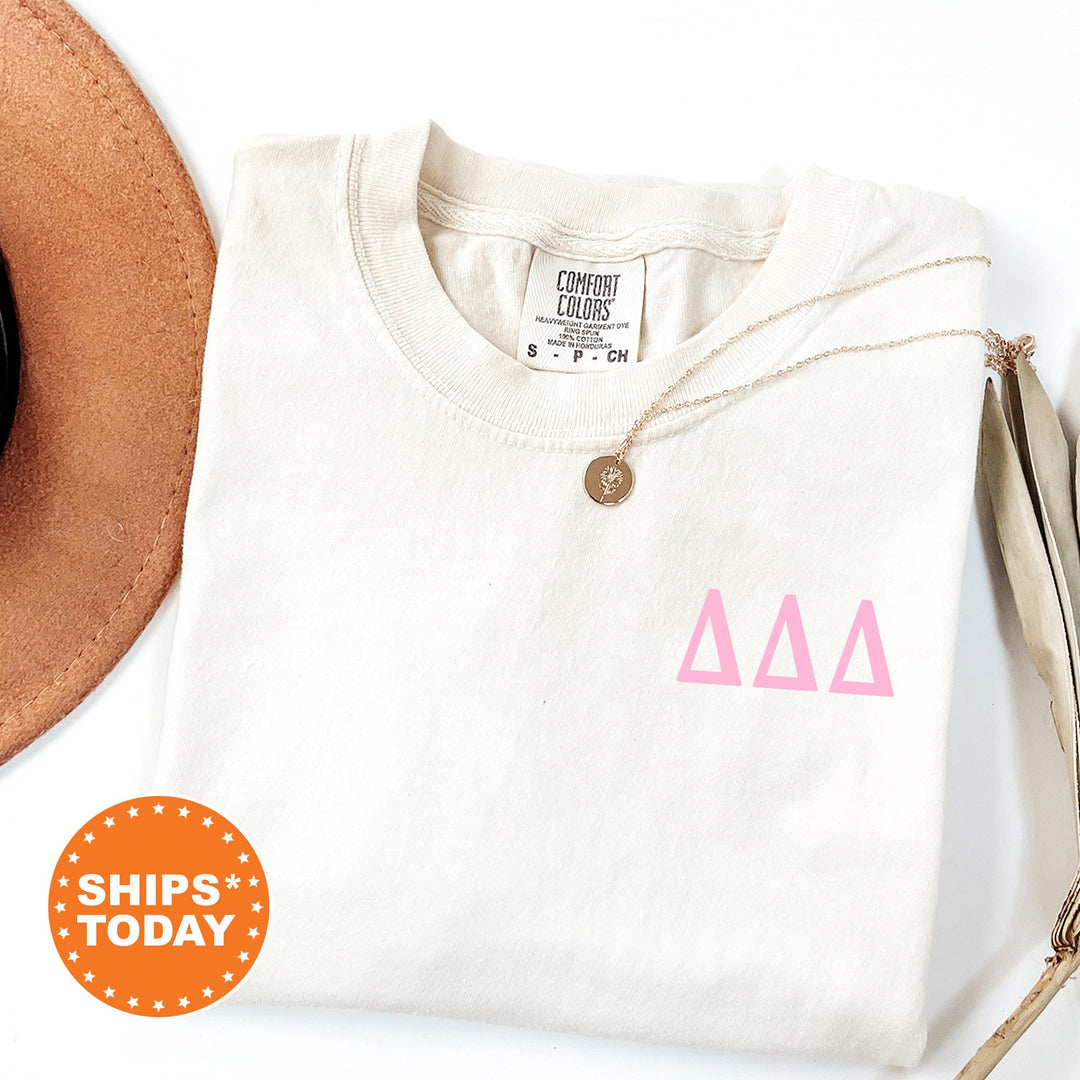 a white shirt with pink letters and a brown hat