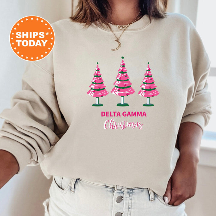a woman wearing a sweatshirt with christmas trees on it