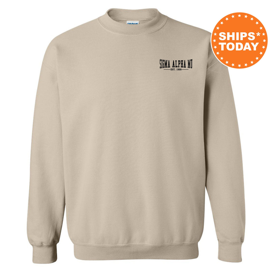a beige sweatshirt with a black and white logo