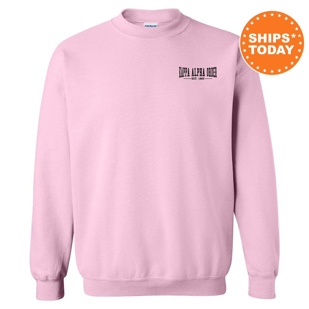 a pink crew neck sweatshirt with the words deep lake road printed on it