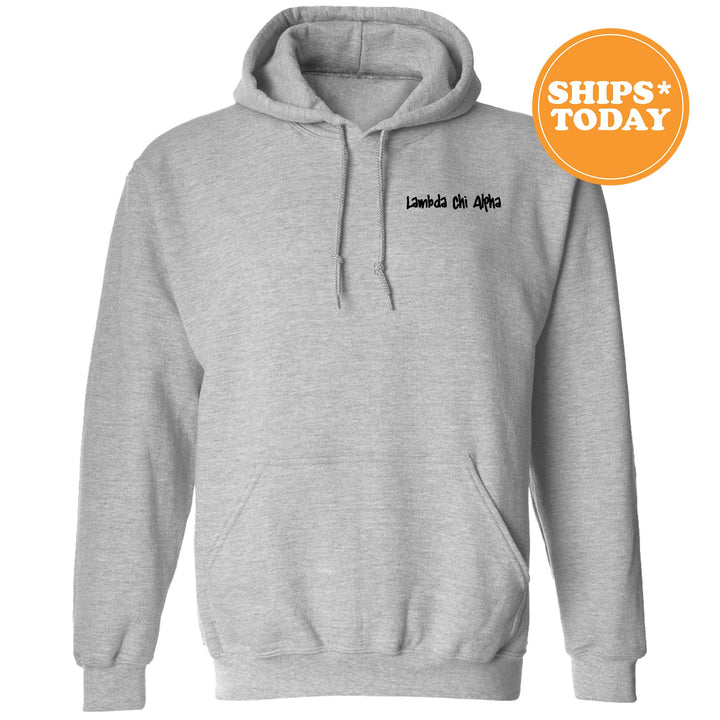 a grey hoodie with a black print on it