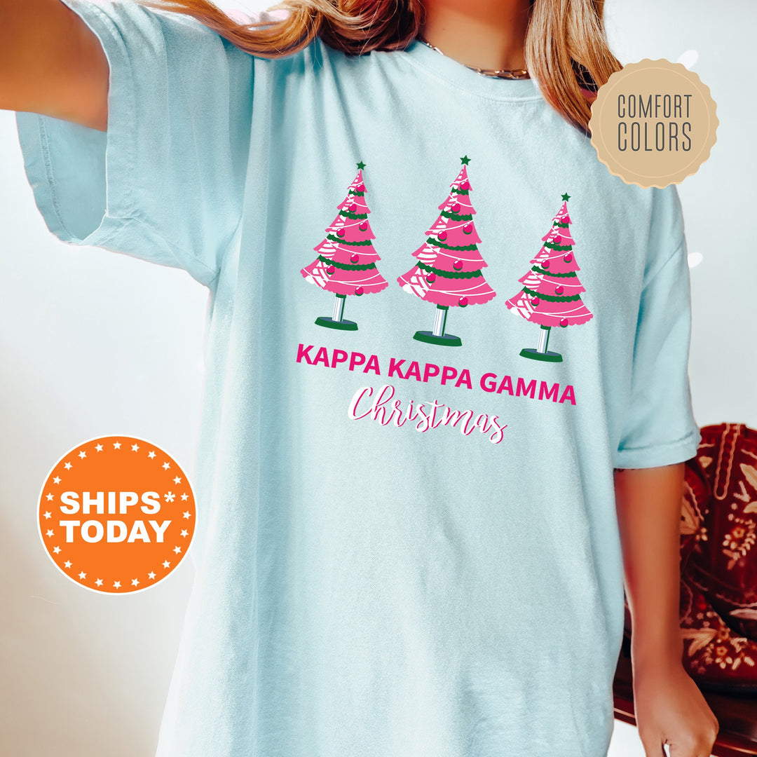 a girl wearing a t - shirt that says kapa kapa gama christmas