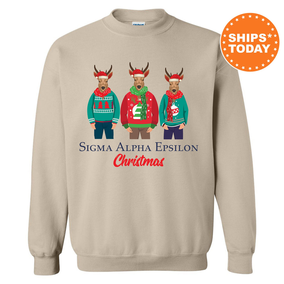 a christmas sweater with three reindeers wearing ugly sweaters