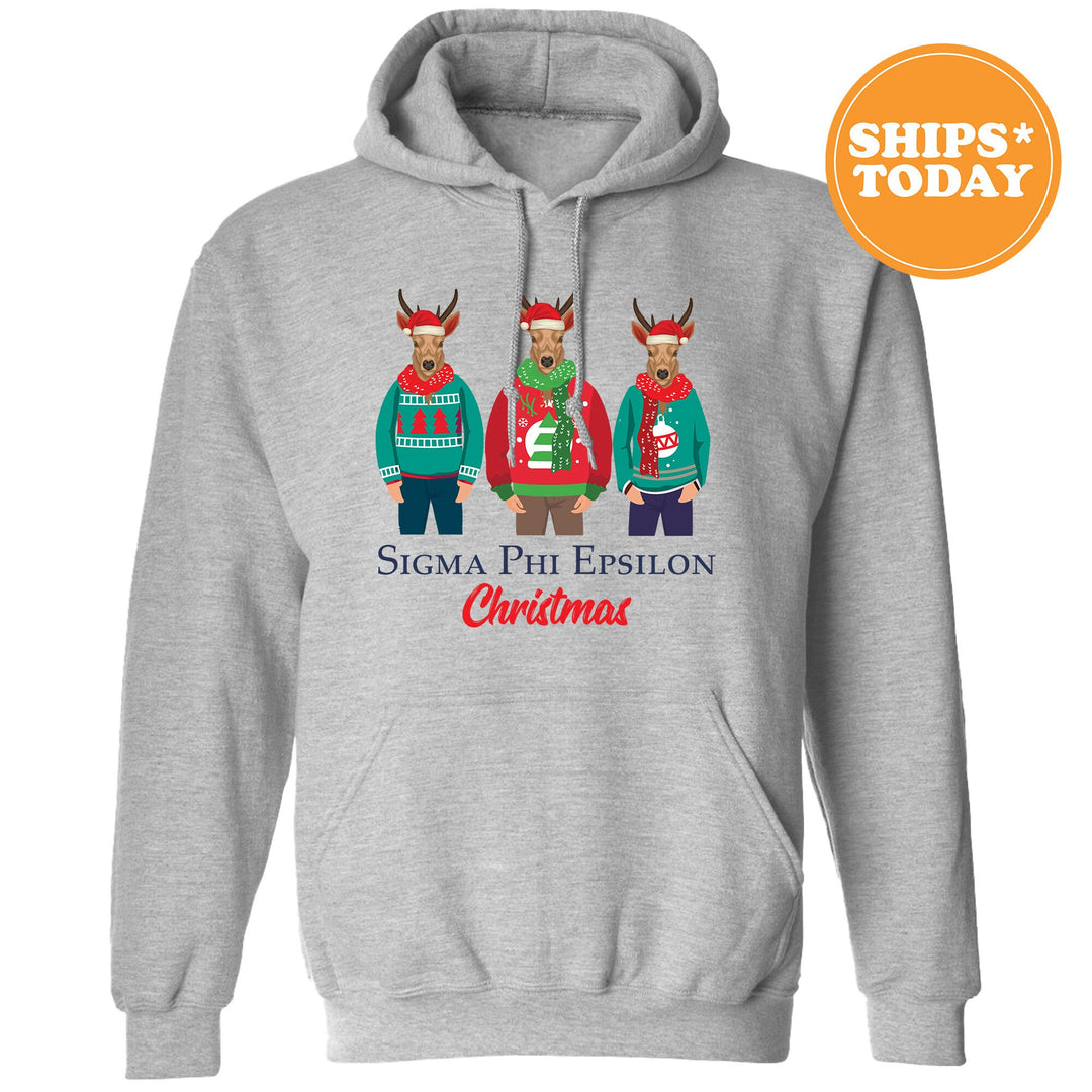 a grey hoodie with three reindeers wearing ugly sweaters