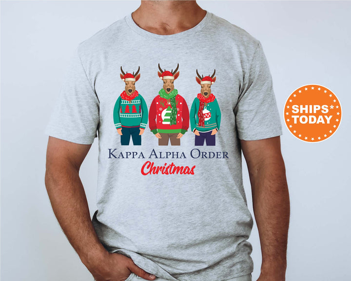 a man wearing a t - shirt with three reindeers wearing ugly sweaters