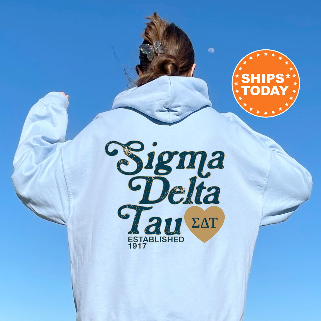 a woman in a white hoodie with the back of her jacket saying, stigma