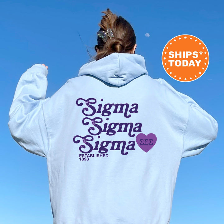 a woman wearing a white hoodie with the words stigma stigma stigma on it