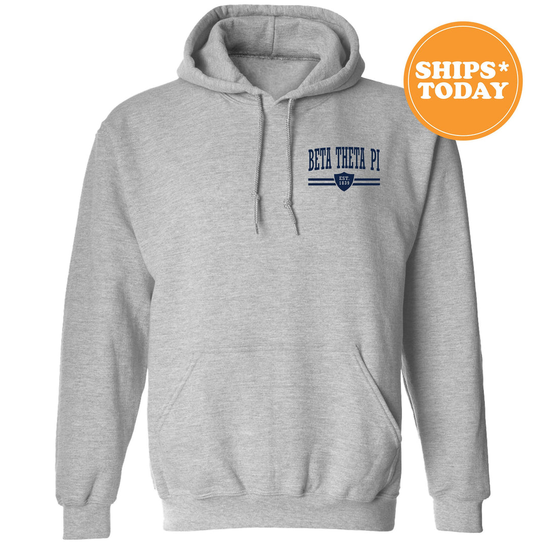 a grey hoodie with a blue and white logo on it