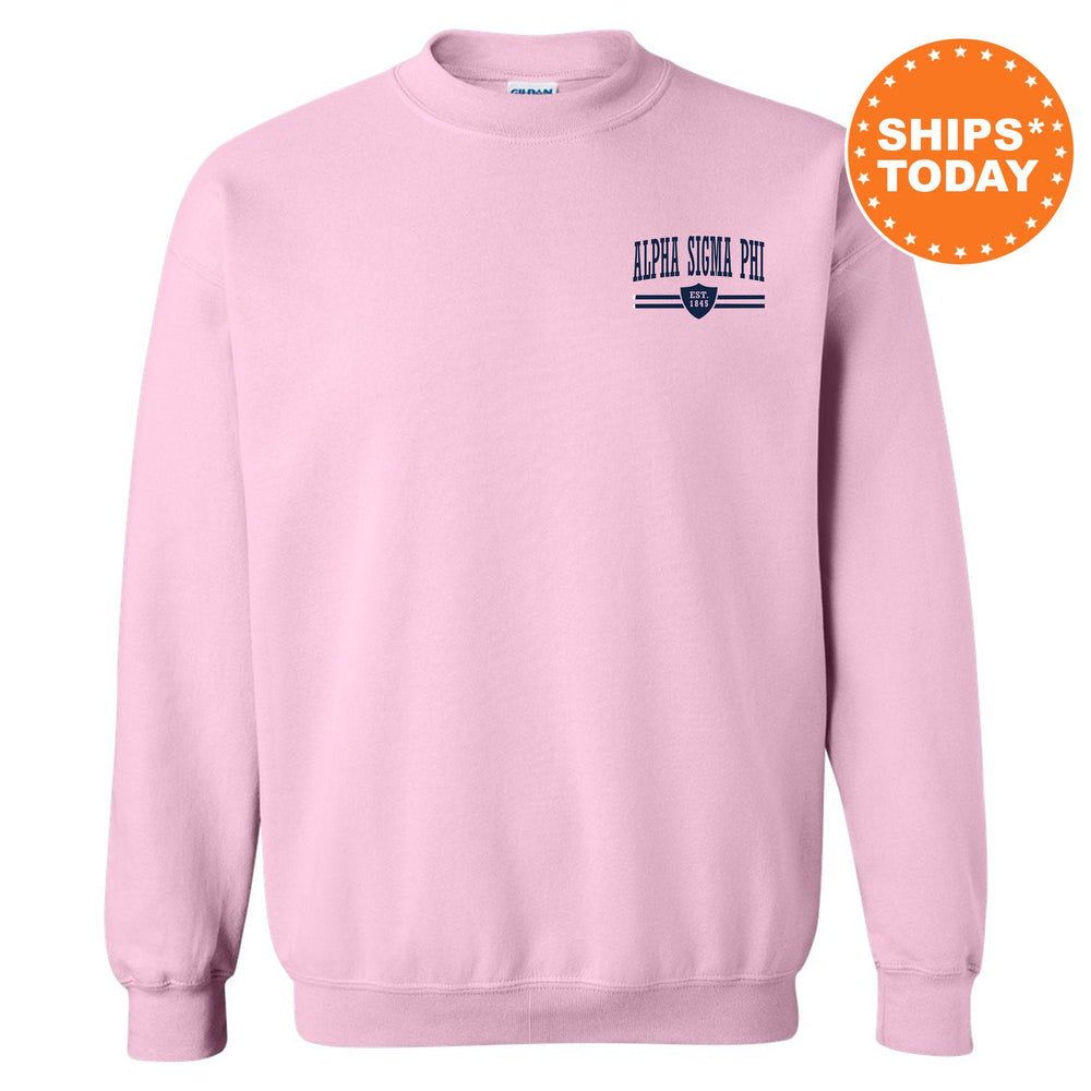 a pink sweatshirt with a blue and white logo