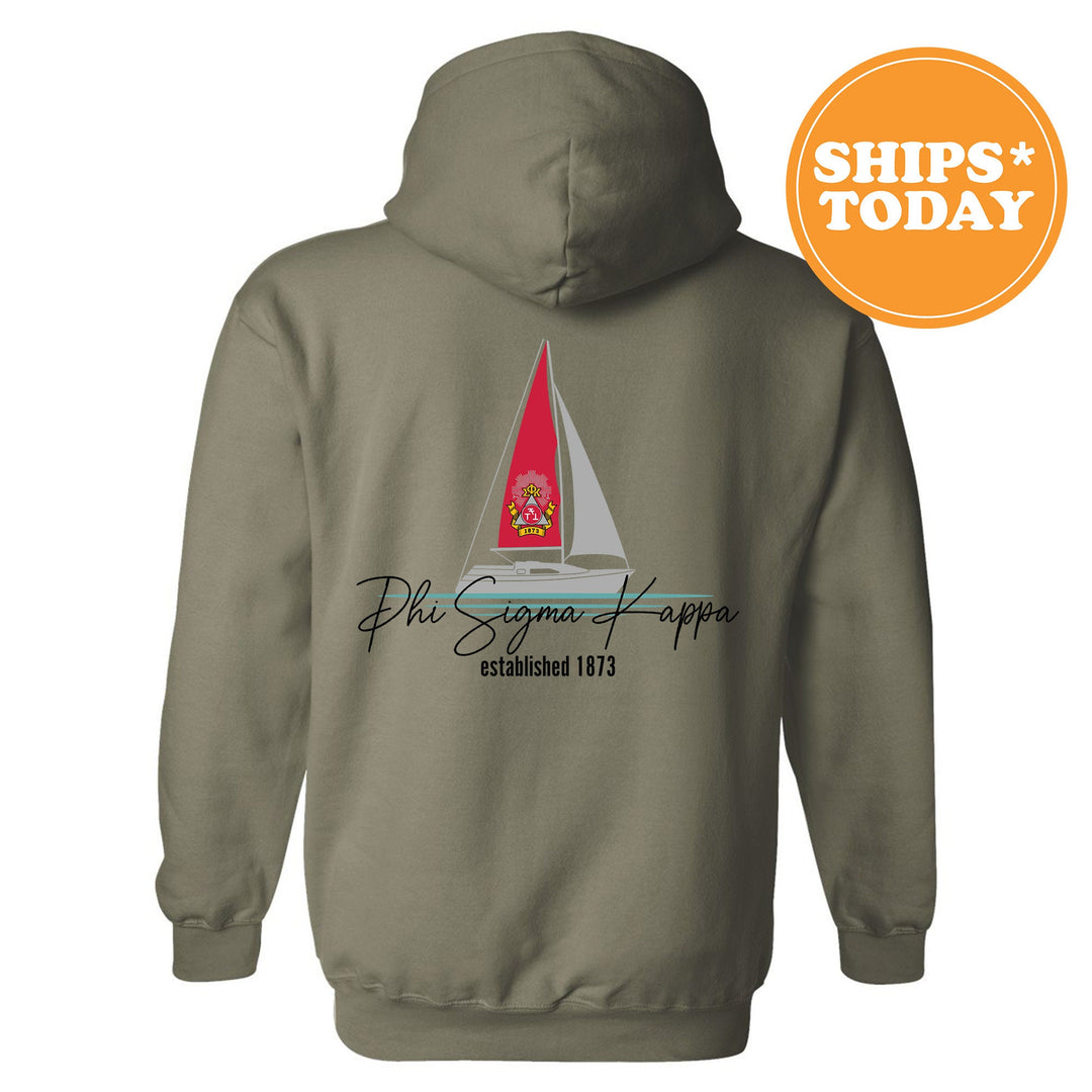 a gray hoodie with a red sailboat on it