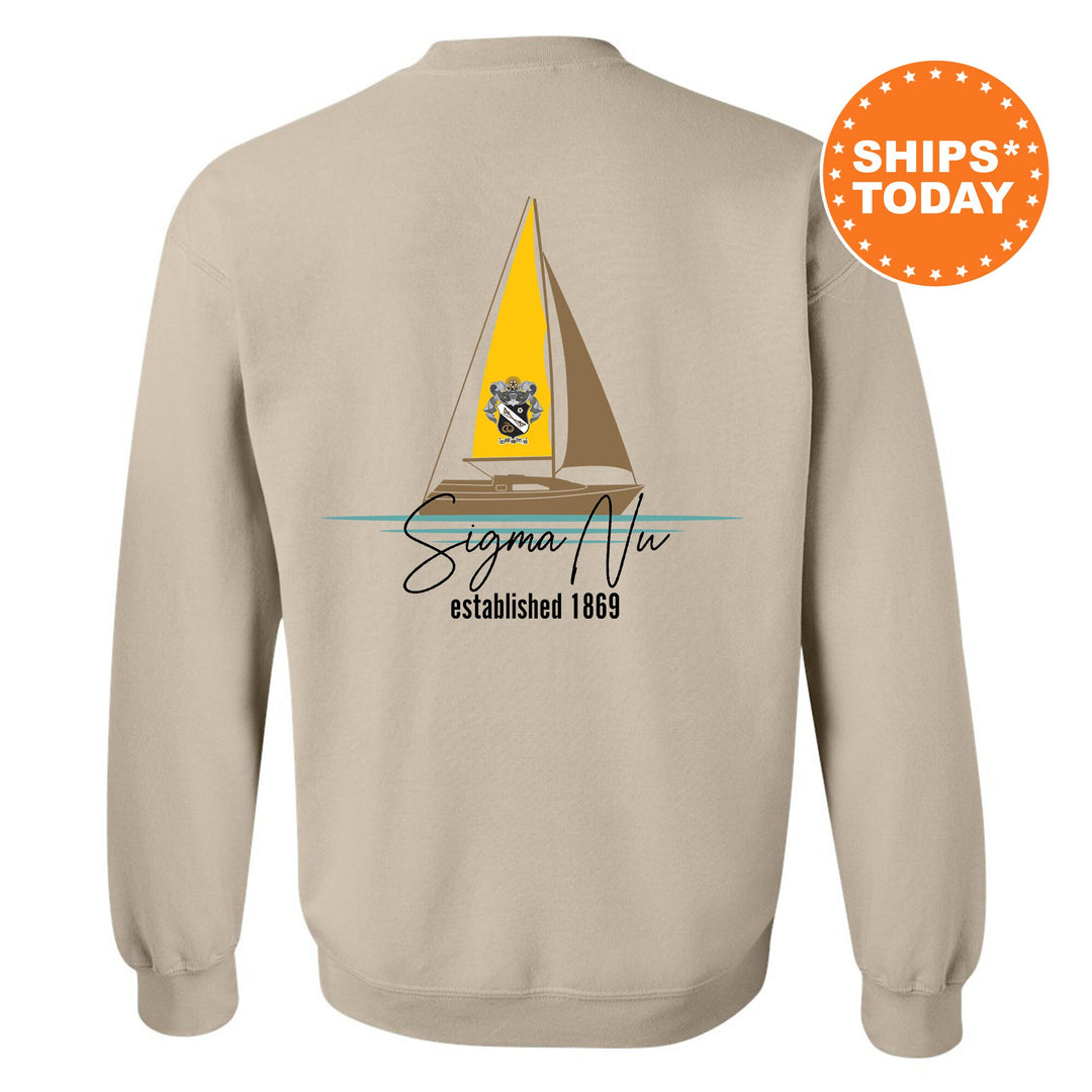 a sweatshirt with a sailboat on the front and a ship on the back