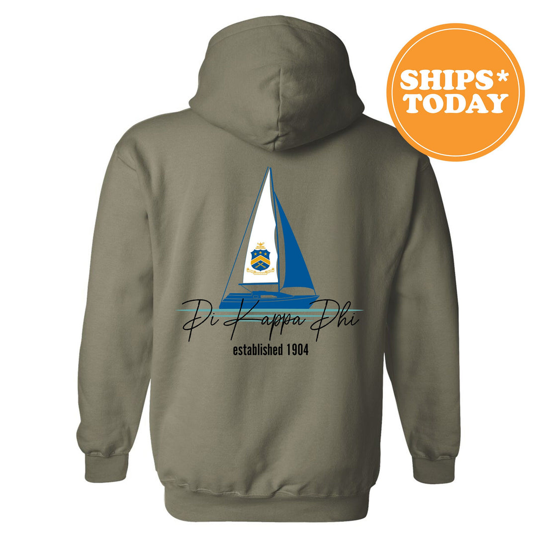 a gray hoodie with a sailboat on it