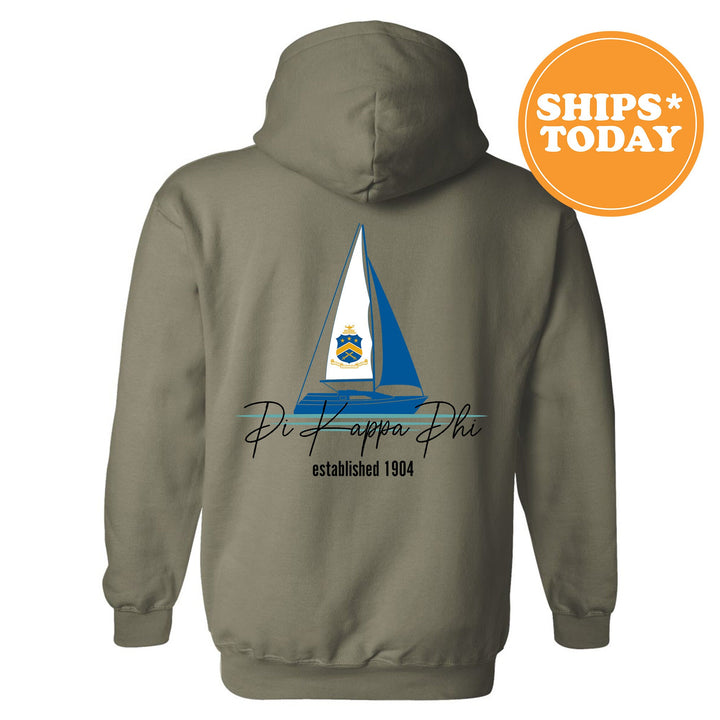 a gray hoodie with a sailboat on it