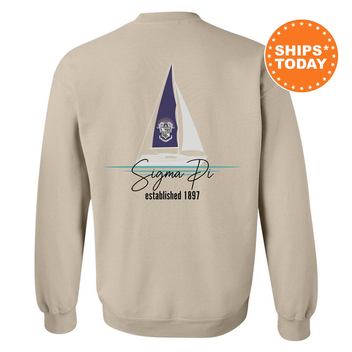 a sweatshirt with a sailboat on it and the name of the boat