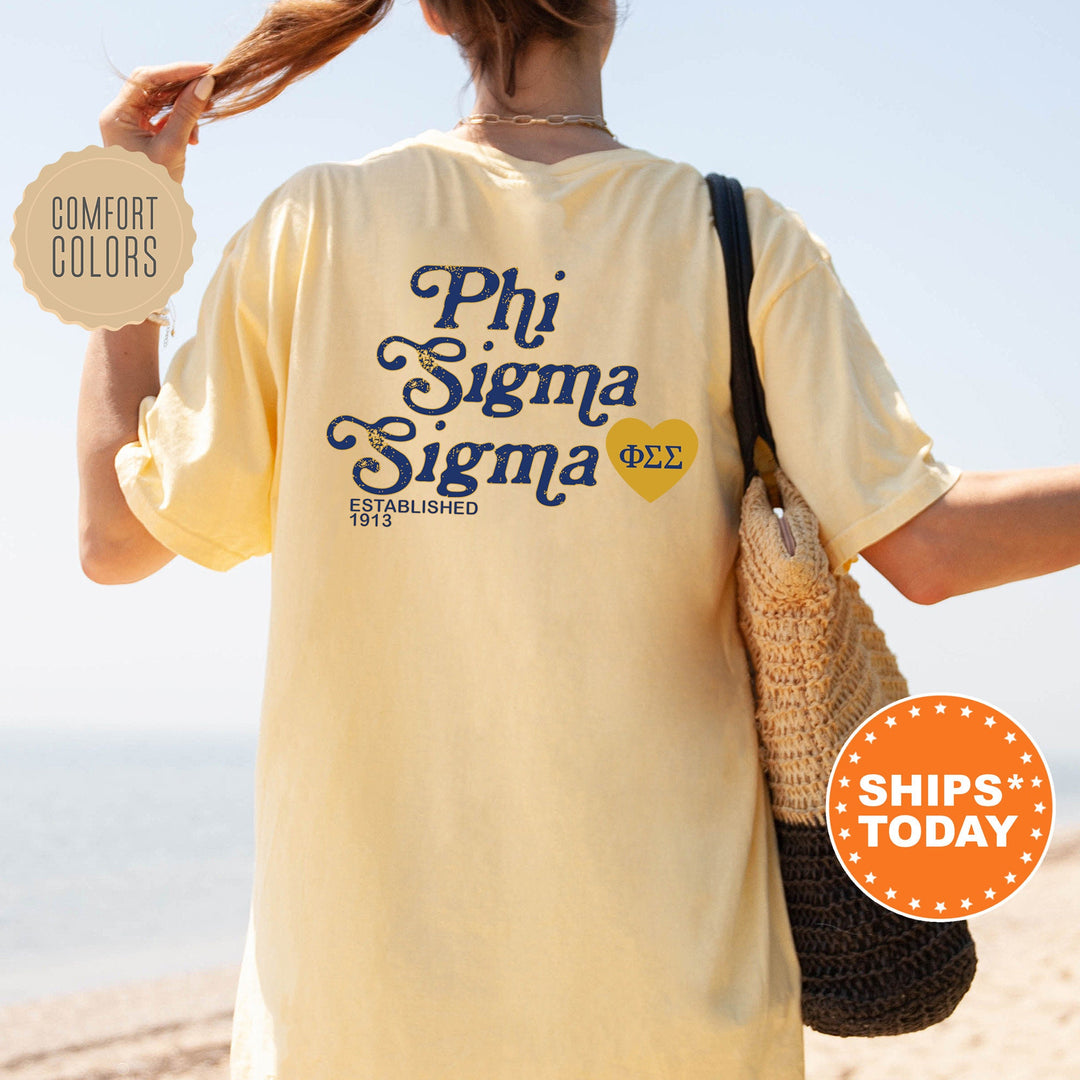 a woman walking on the beach holding a sign that says phi sigma si