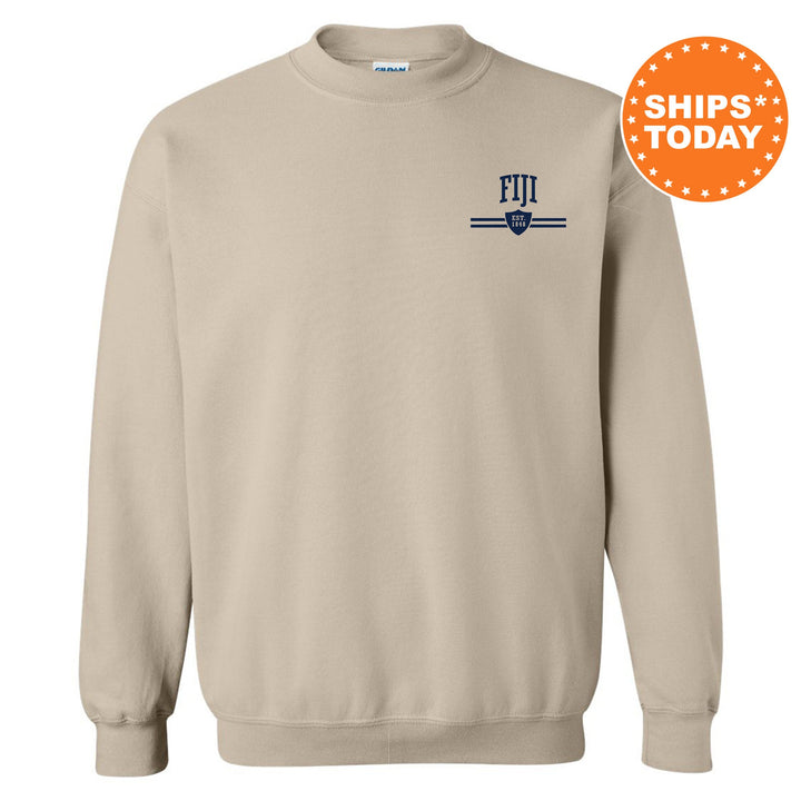 a beige sweatshirt with a blue and white logo on it