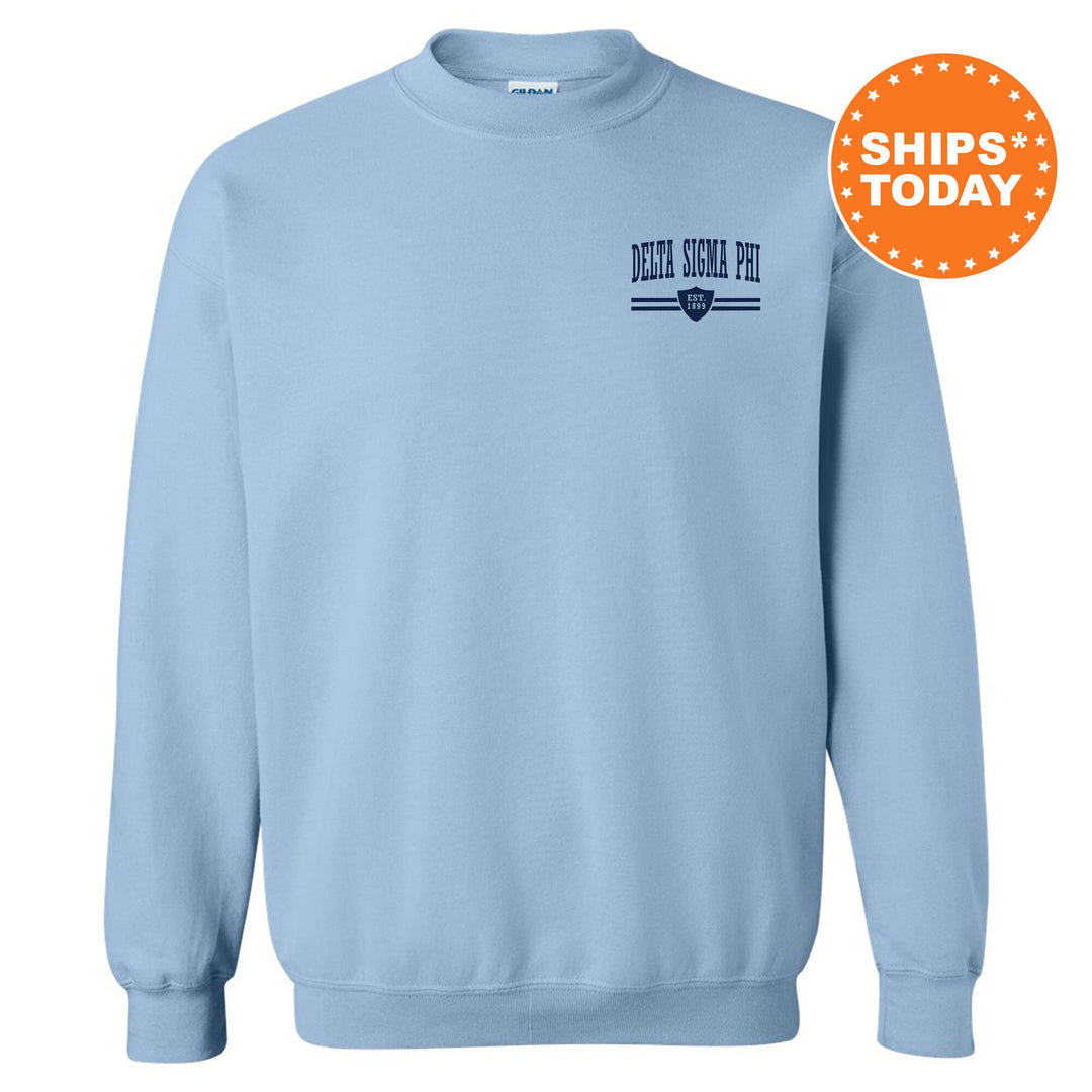 a light blue crew neck sweatshirt with an embroidered logo