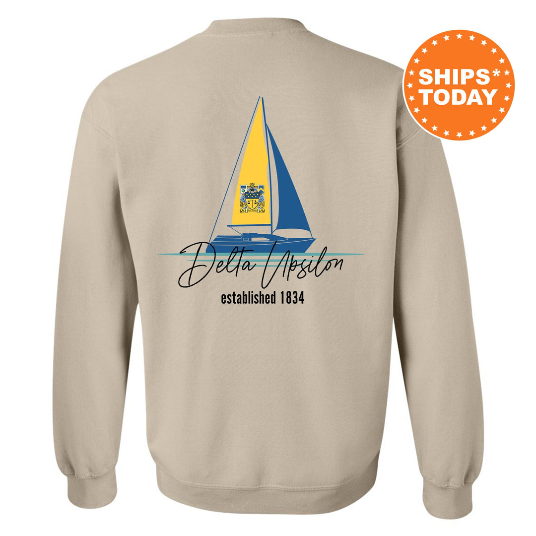 a sweatshirt with a sail boat on it