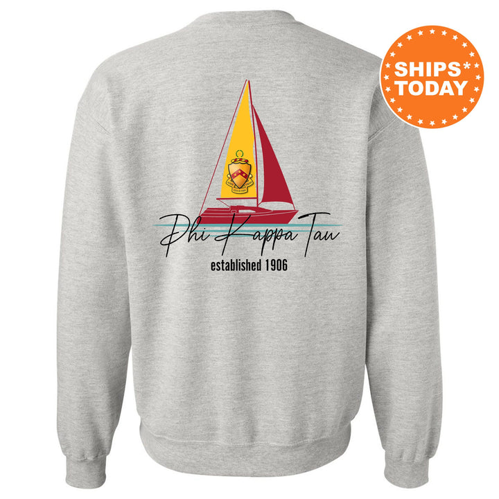 a sweatshirt with a sailboat on it