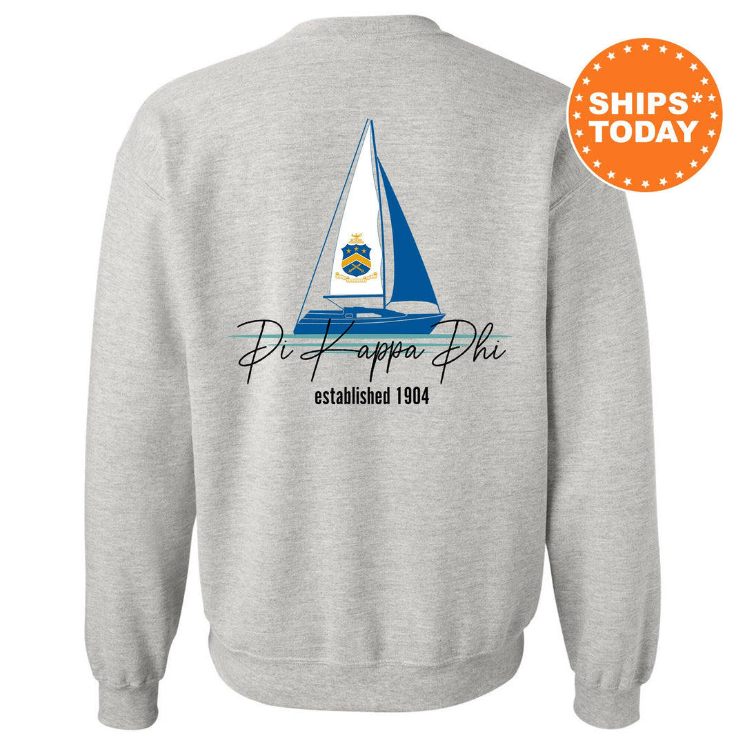 a sweatshirt with a sail boat on it