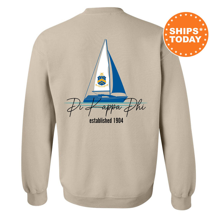 a sweatshirt with a sail boat on it