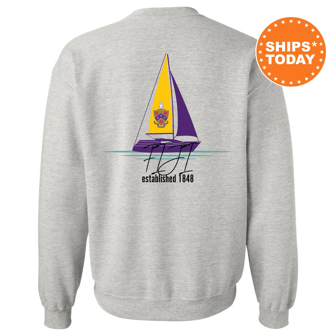 a sweatshirt with a sail boat on it