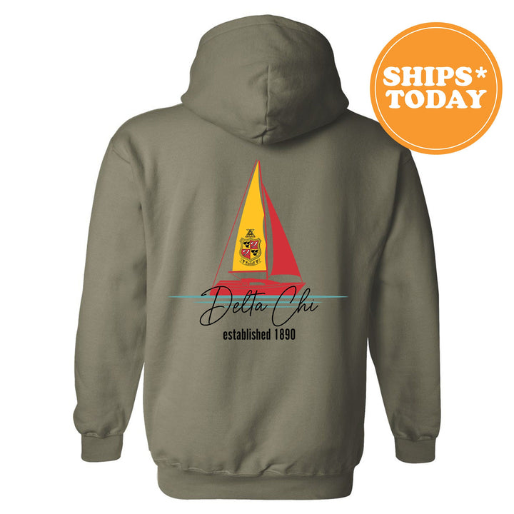 a gray hoodie with a sailboat on it