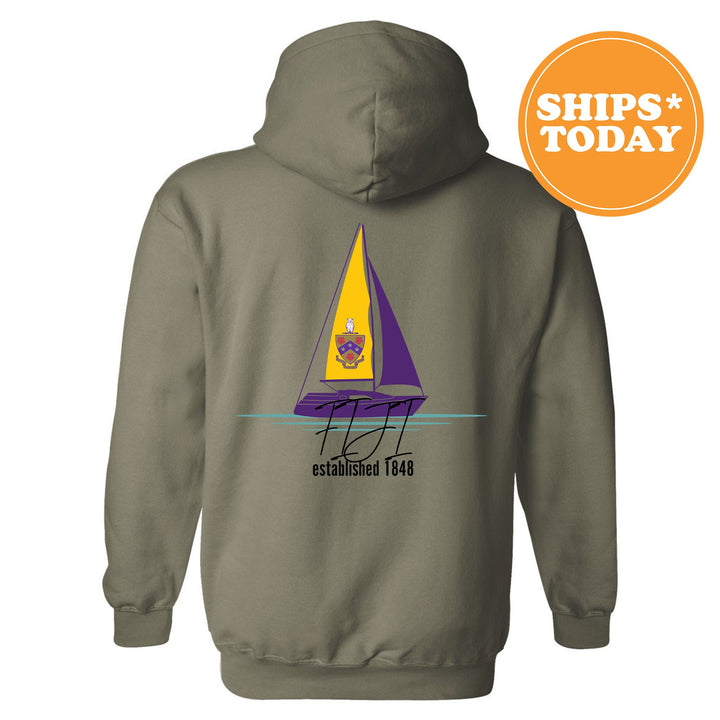 a gray hoodie with a sail boat on it